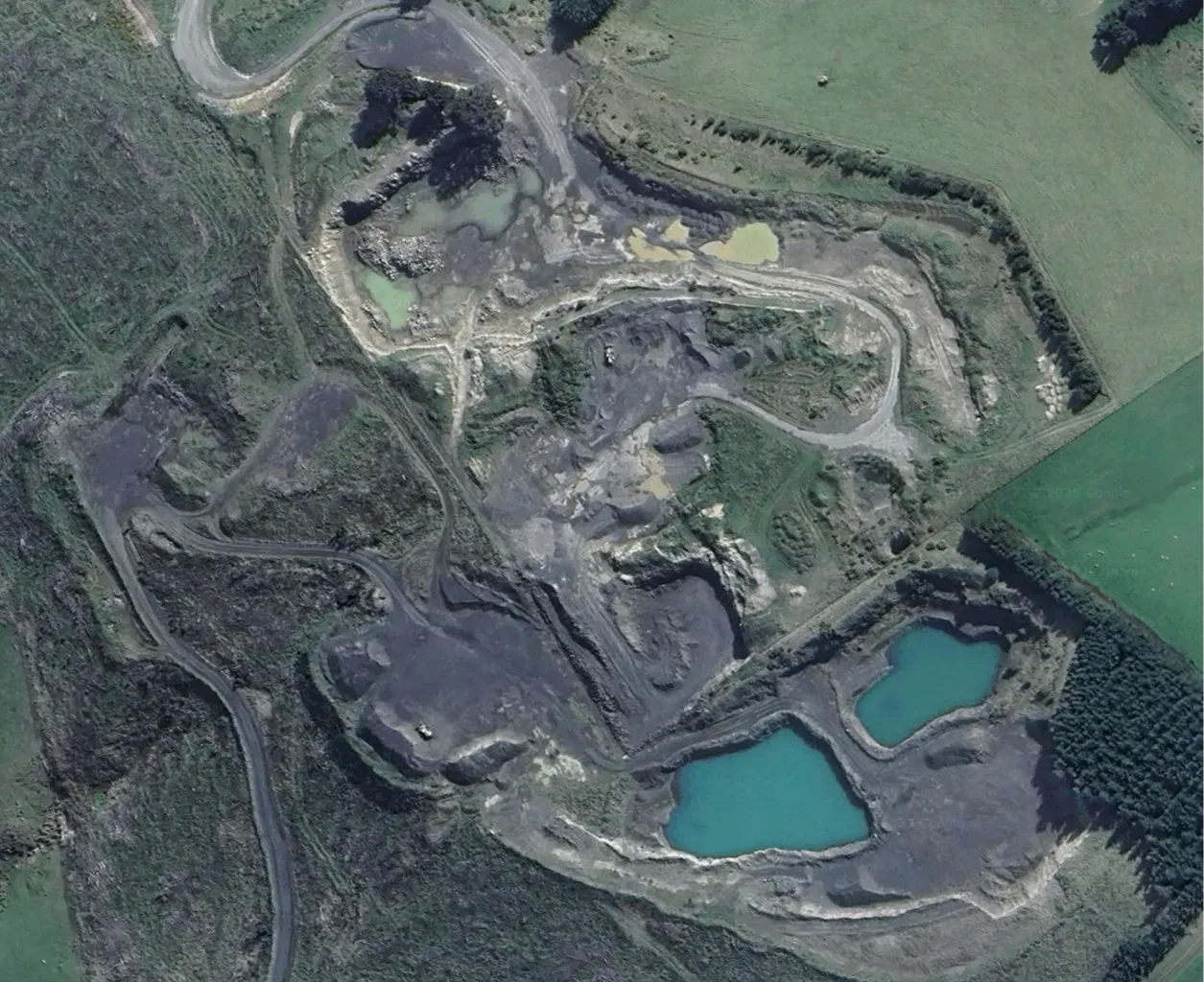 Satellite image of Blackhead Quarries’ Lee Stream operation with quarry pits, access roads and water-filled settling ponds.