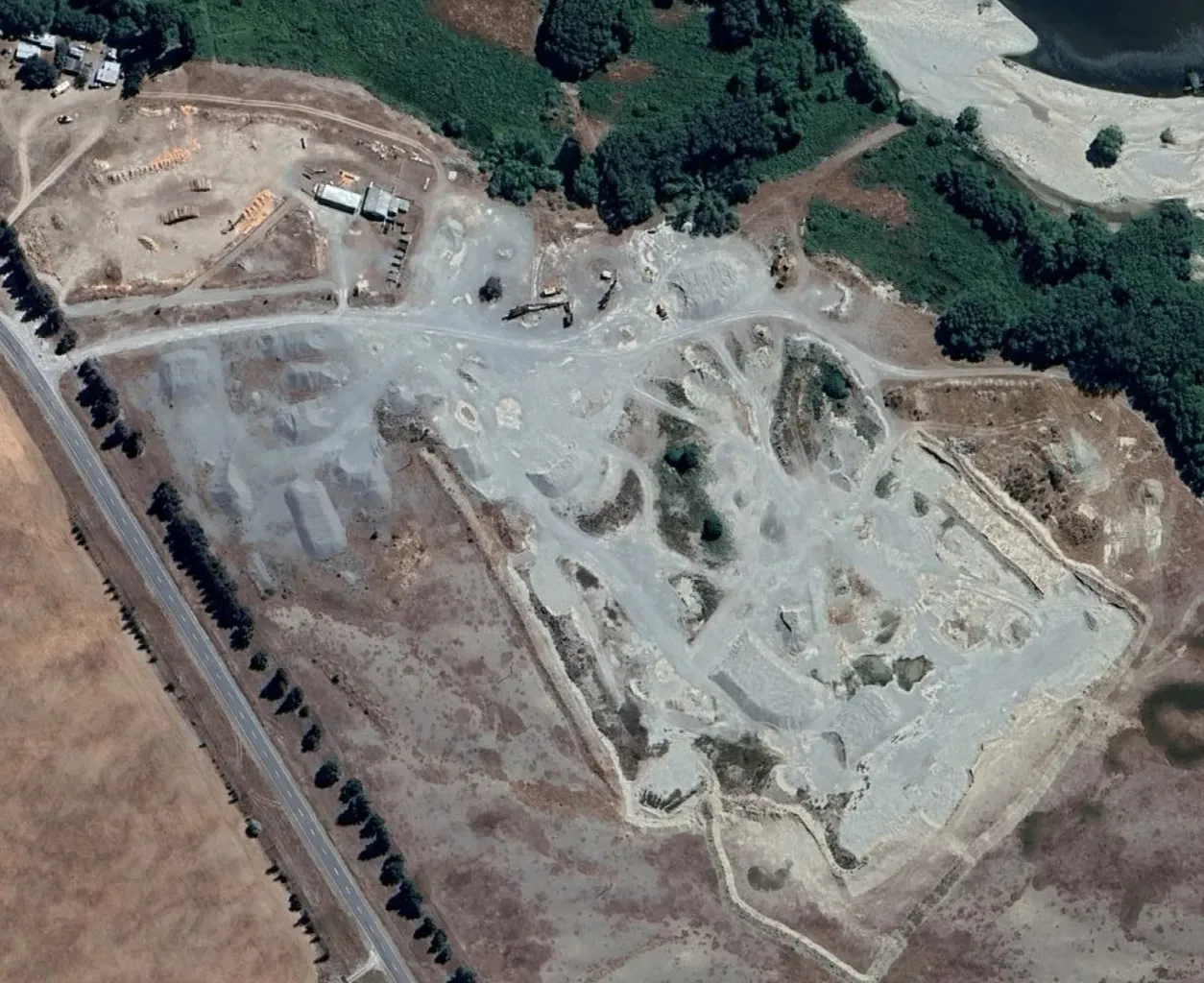 Aerial view of Blackhead Quarries’ Omarama site, showing extraction areas, stockpiles and surrounding dryland terrain.